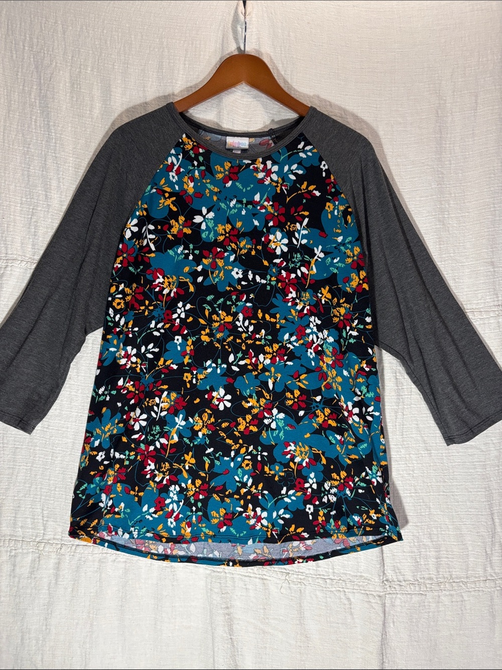 LuLaRoe Teal Floral Raglan with Charcoal Sleeves